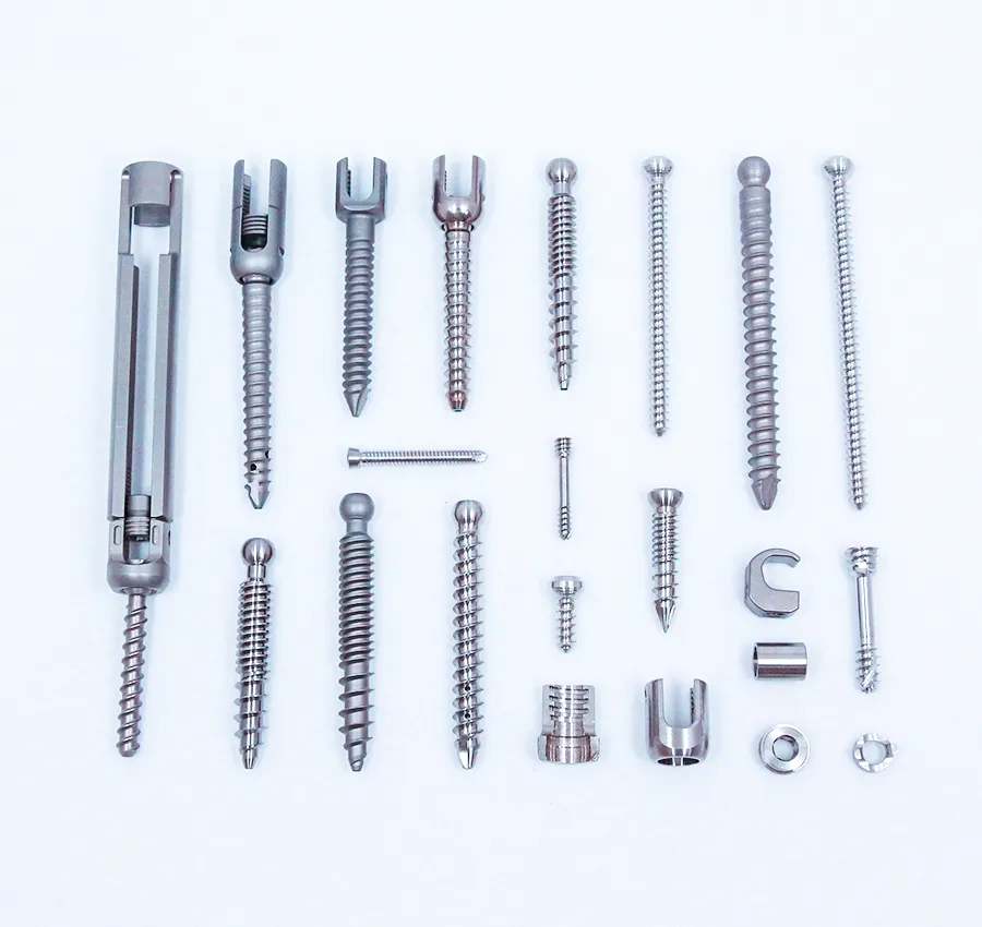 Various orthopedic implants made of titanium, including pedicle screws, connectors, and bone pins